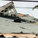 Hurricane damage to the roof of a house - keep pests away from your home with florida pest control