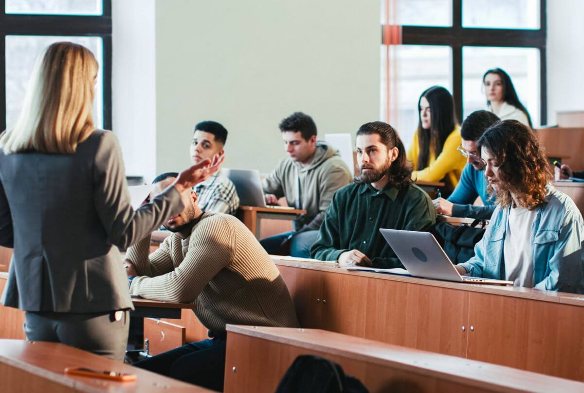 Students sitting in classroom listening to a lecture