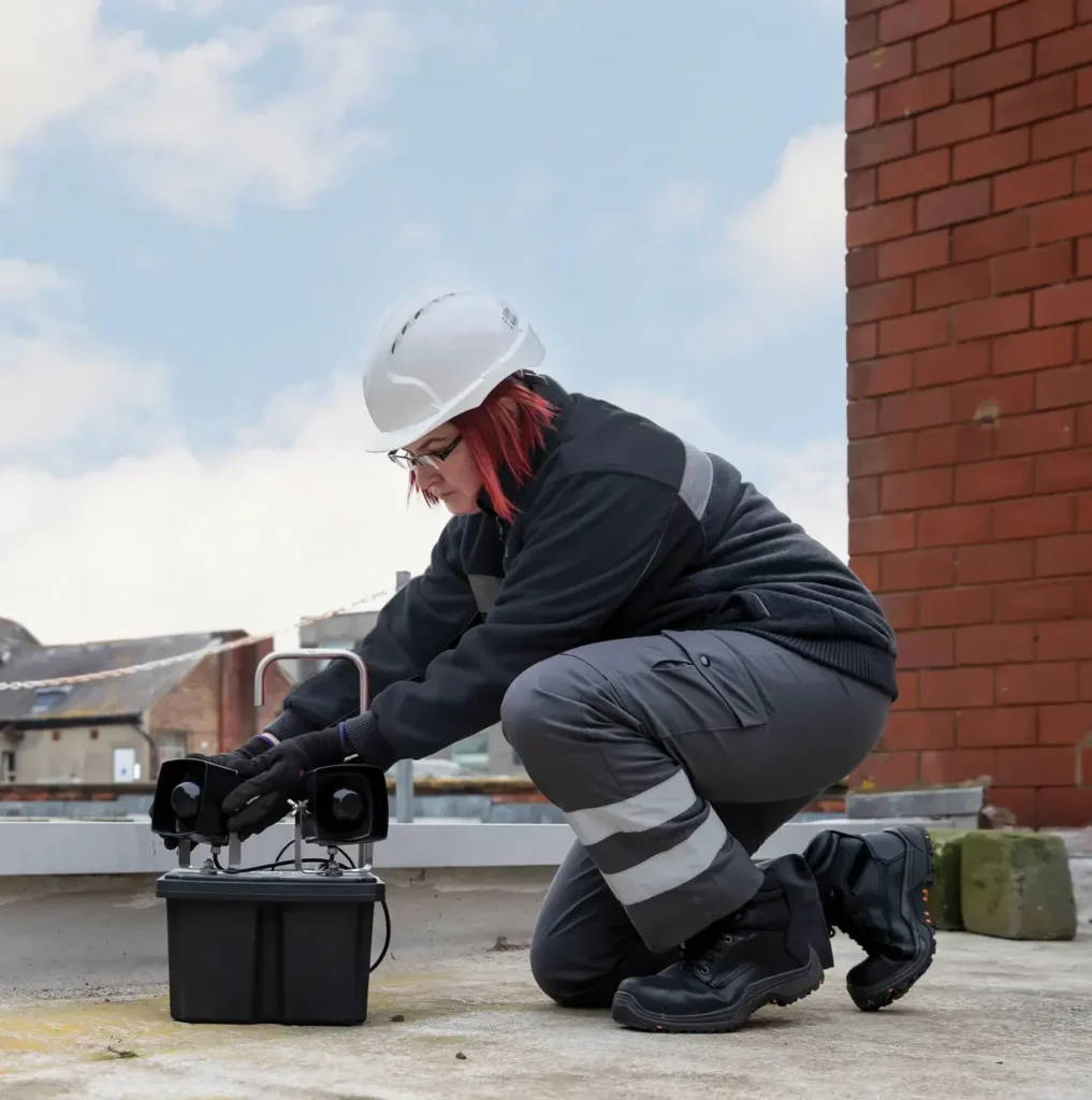 colleague installing BirdAlert on room