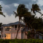 coast home on beachfront during storm